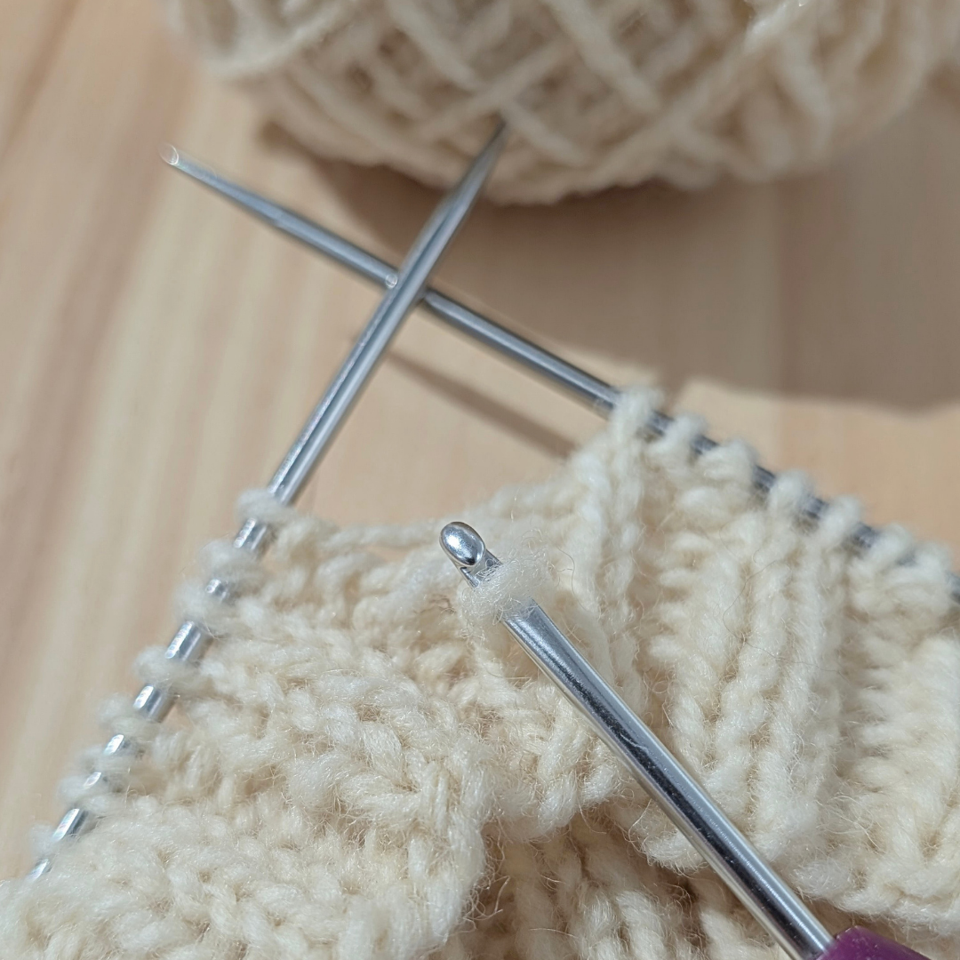 SOS tricot